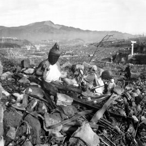 Battered religious figures stand watch on a hill above a tattered valley.  Nagasaki, Japan.  September 24, 1945.  Cpl. Lynn P. Walker, Jr.  (Marine Corps)
NARA FILE #:  127-N-136176
WAR & CONFLICT BOOK #:  1241